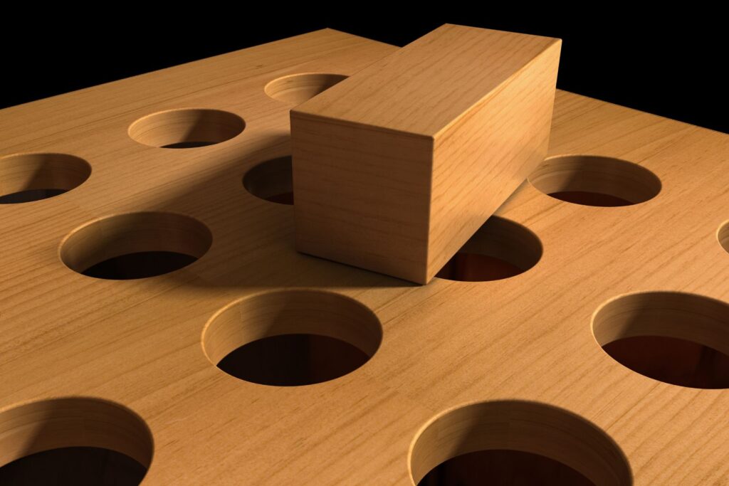 Square peg mismatched with round holes